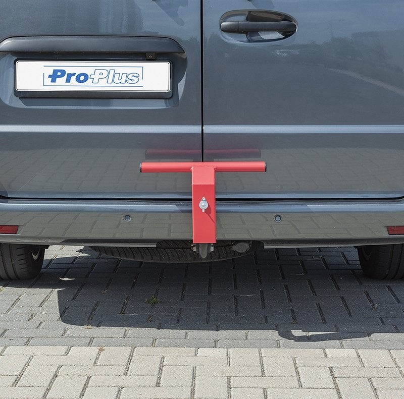 Antivol pour porte arrière de camionnette à fixer sur l'attelage.