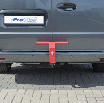 Antivol pour porte arrière de camionnette à fixer sur l'attelage.